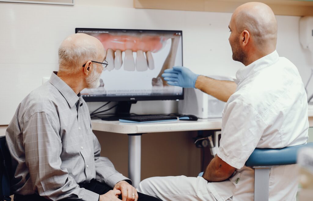 Old man sitting in the dentist's office